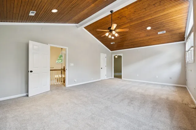 a house with swimming pool in front of it