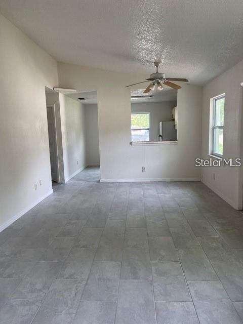 3145 Huron Avenue, Unit A Oldsmar, FL 34677 - Photo 2 of 10 an empty room with windows and entrance