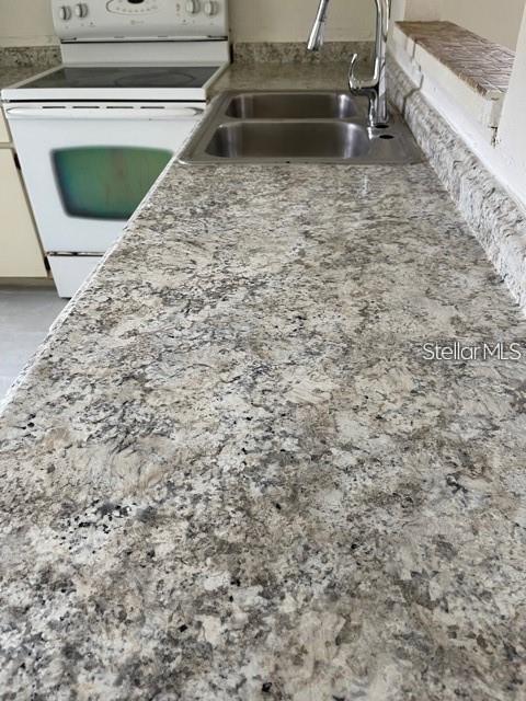 3145 Huron Avenue, Unit A Oldsmar, FL 34677 - Photo 4 of 10 a bathroom with a sink and a toilet