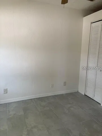 a kitchen with a stove a sink and a refrigerator