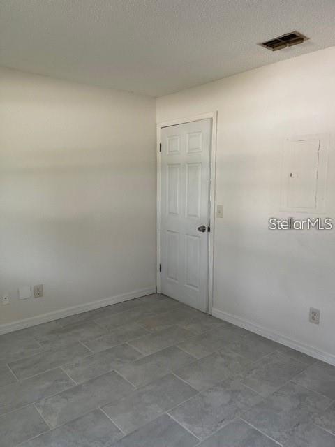 3145 Huron Avenue, Unit A Oldsmar, FL 34677 - Photo 9 of 10 wooden floor in an empty room