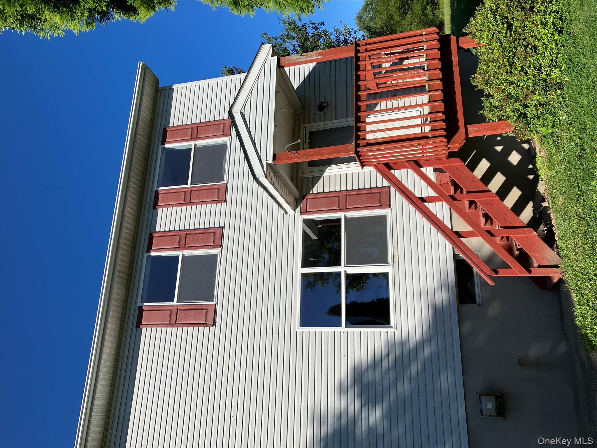 View of front facade with stairs