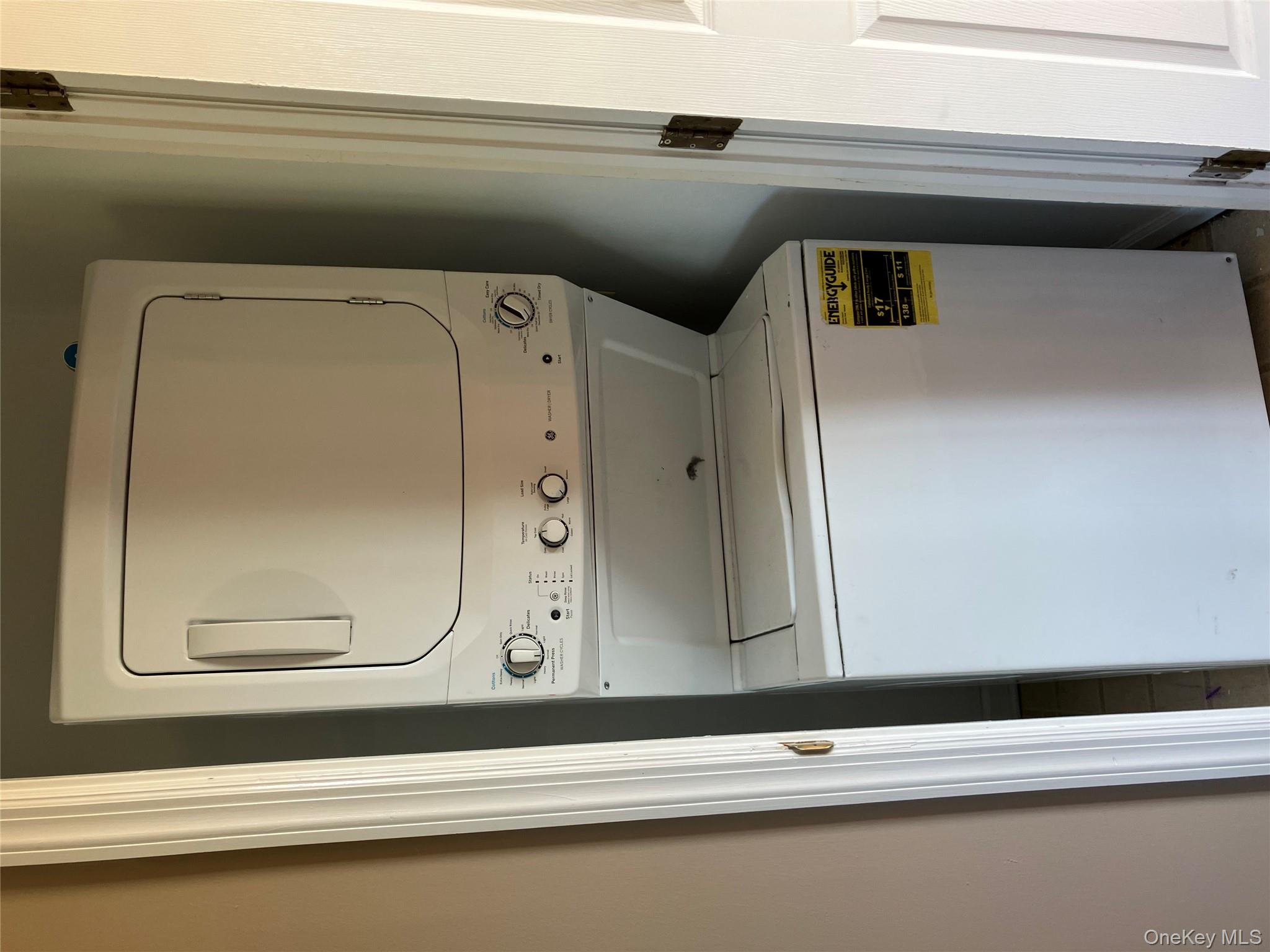 133 Ridgebury Road New Hampton, NY 10958 - Photo 11 of 14 Laundry area with stacked washing machine and dryer