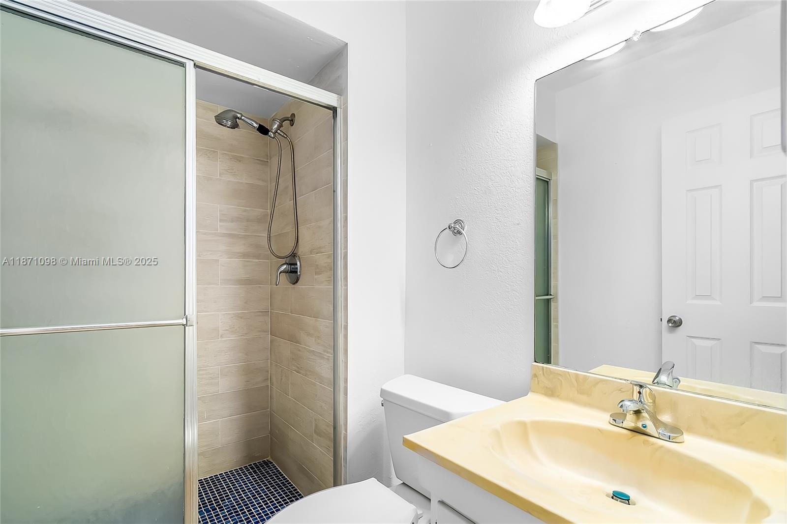 2500 Southwest 81st Avenue, Unit 402 Davie, FL 33324 - Photo 16 of 51 a bathroom with a sink toilet and shower