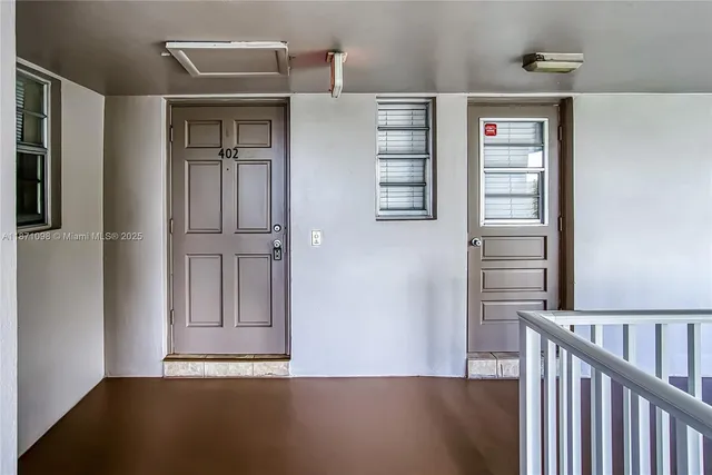 a view of a park with large trees