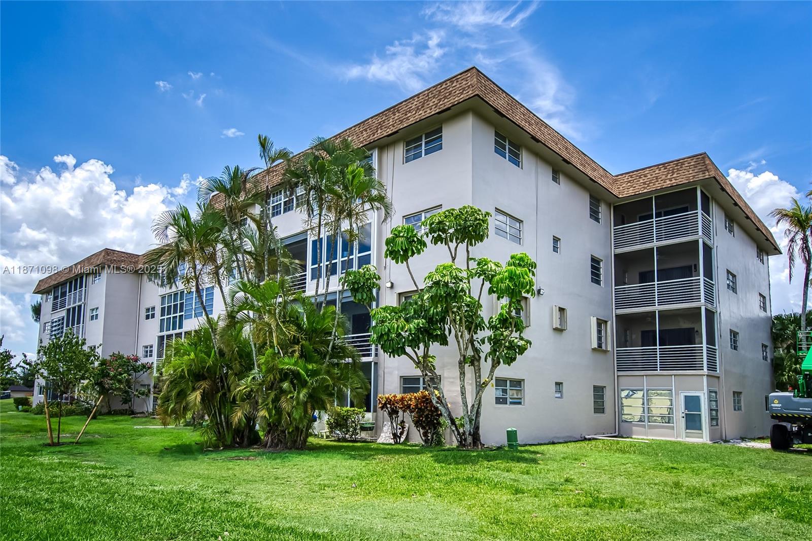2500 Southwest 81st Avenue, Unit 402 Davie, FL 33324 - Photo 35 of 51 a front view of a house with a yard