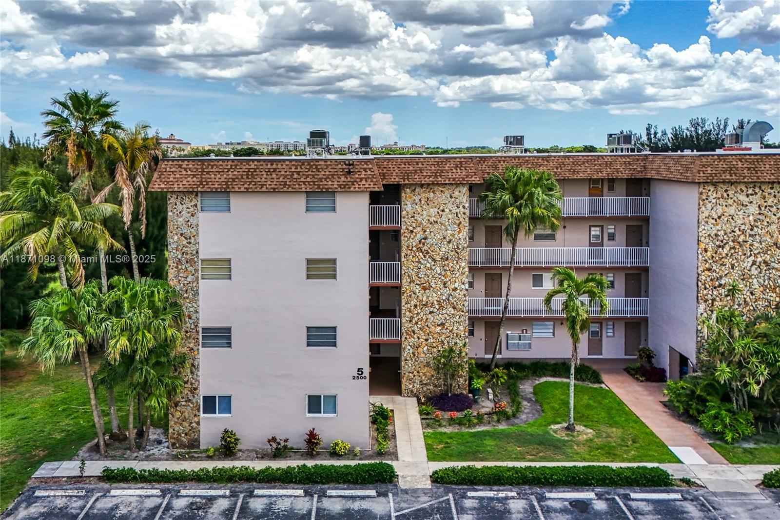 2500 Southwest 81st Avenue, Unit 402 Davie, FL 33324 - Photo 43 of 51 a view of a yard in front of a building