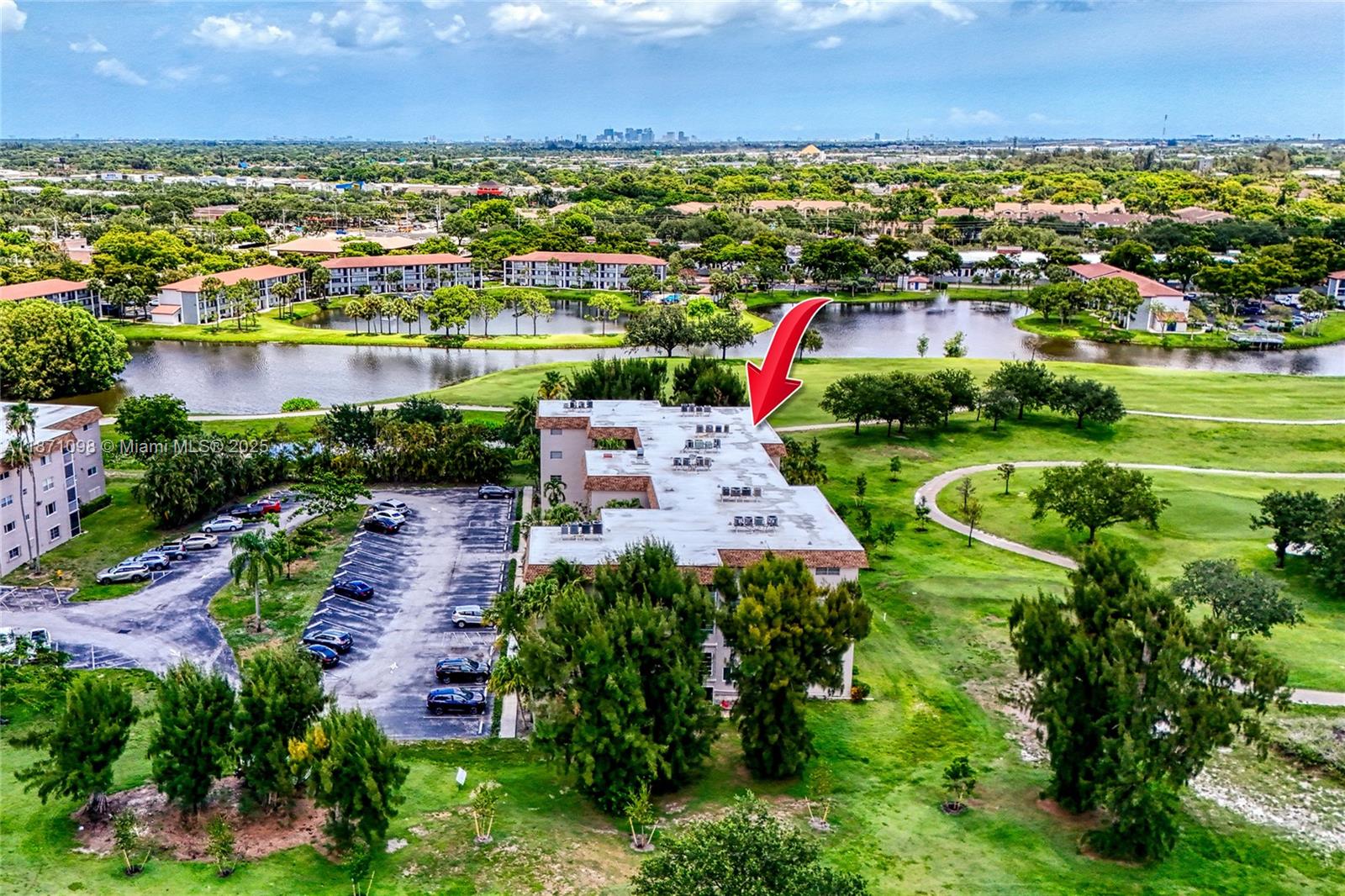 2500 Southwest 81st Avenue, Unit 402 Davie, FL 33324 - Photo 45 of 51 an aerial view of a houses with a lake view
