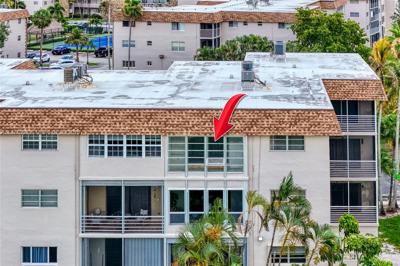 2500 Southwest 81st Avenue, Unit 402 Davie, FL 33324 - Photo 46 of 51 a front view of a house with a yard