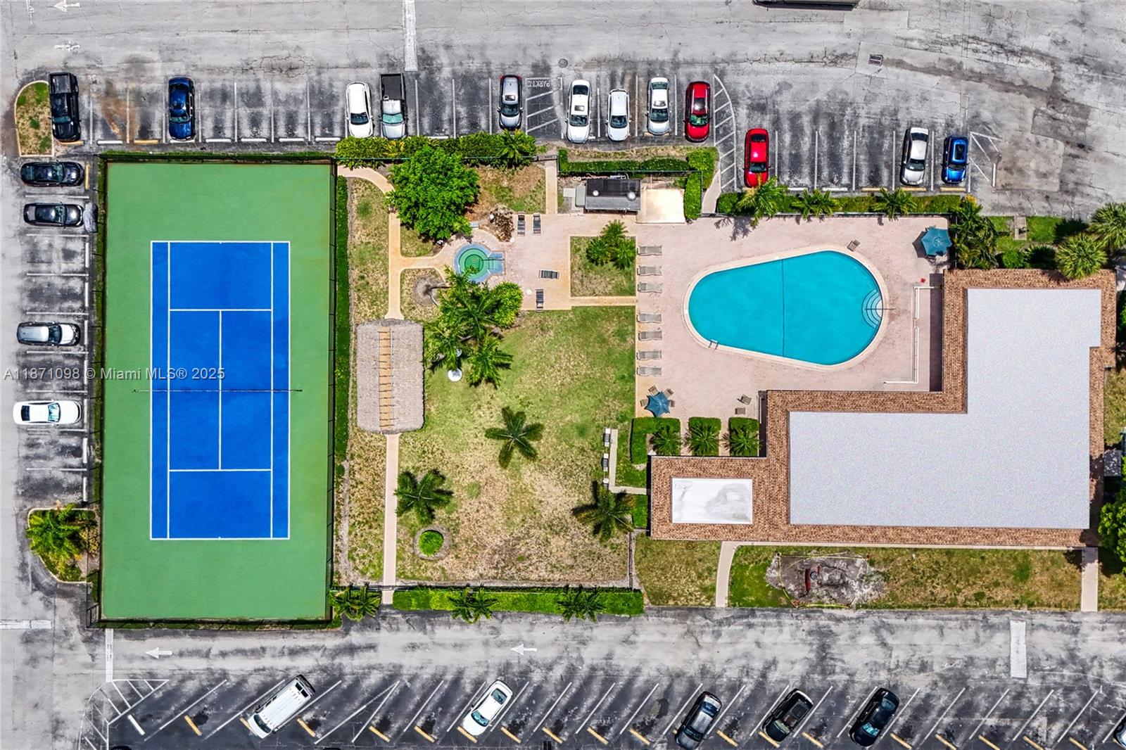 2500 Southwest 81st Avenue, Unit 402 Davie, FL 33324 - Photo 49 of 51 a aerial view of a house with a yard and potted plants