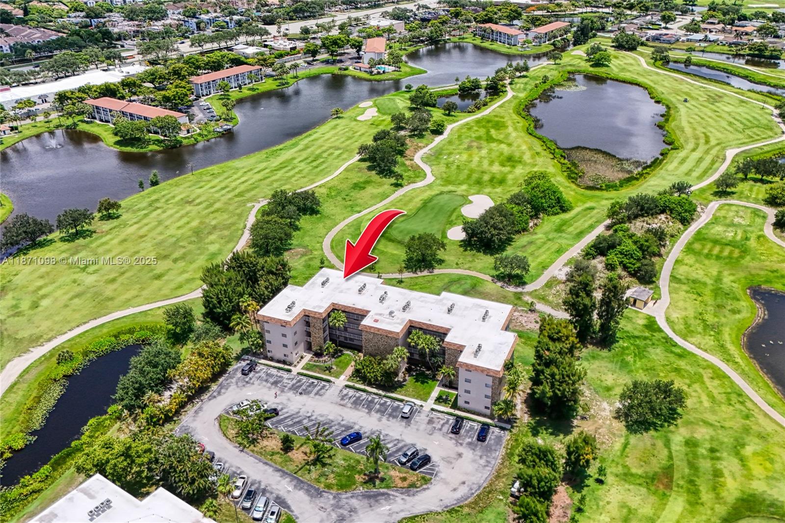 2500 Southwest 81st Avenue, Unit 402 Davie, FL 33324 - Photo 50 of 51 an aerial view of residential houses with outdoor space and lake view