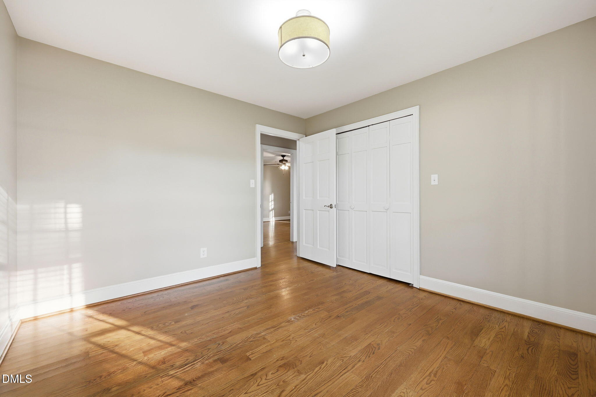 1130 Prospect Church Road Dunn, NC 28334 - Photo 29 of 47 a view of an empty room with wooden floor