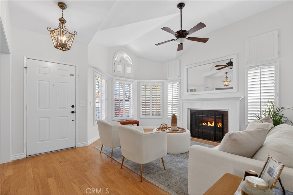 25837 Anderson Lane Stevenson Ranch, CA 91381 - Photo 4 of 22 a living room with furniture and a fireplace
