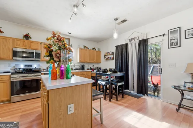 a living room with furniture fireplace and flat screen tv