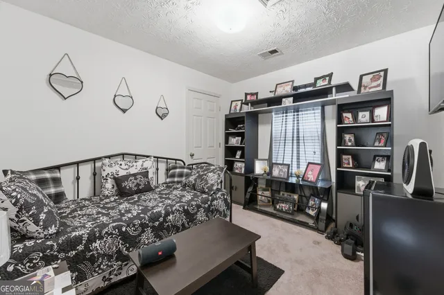 a workspace with furniture and window