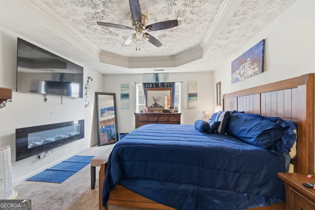 a bedroom with a bed and dresser