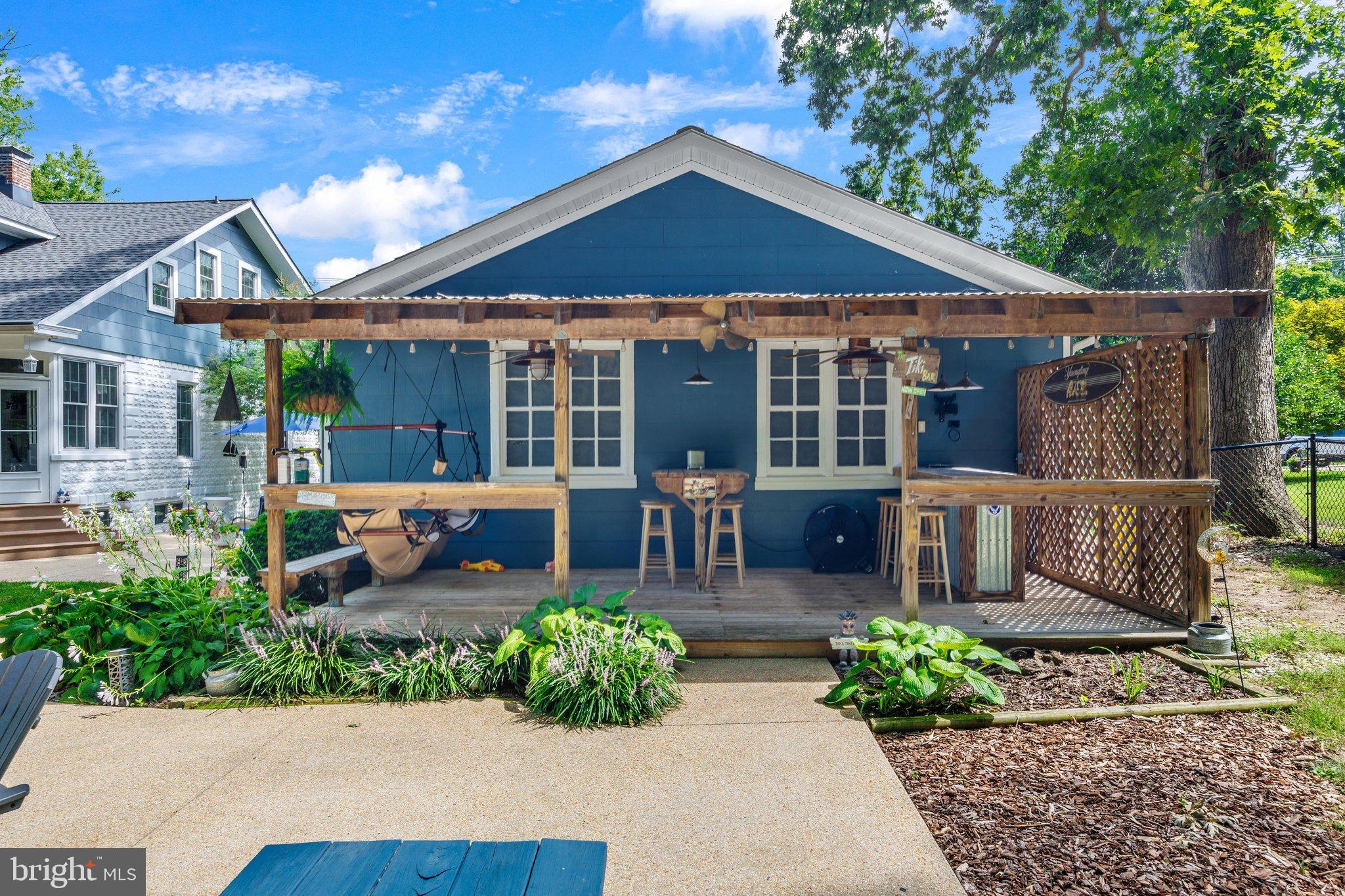 522 Old Hammonds Ferry Road Linthicum Heights, MD 21090 - Photo 57 of 109 Charming blue home with inviting porch space.