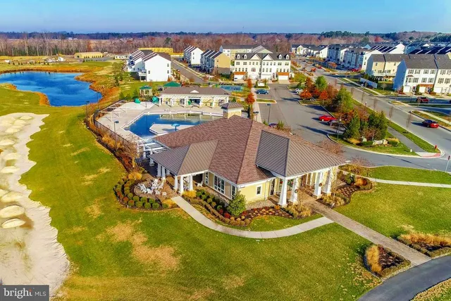 a view of a swimming pool with an ocean view