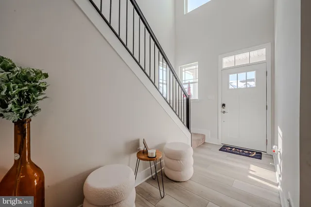 a view of a hallway with seating area