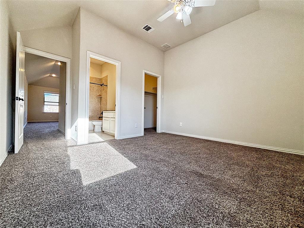 3037 Crestwater Ridge Keller, TX 76248 - Photo 18 of 25 en empty room with fan and mirror