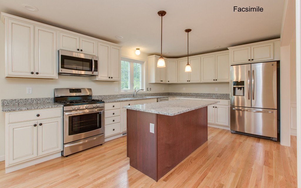 Lot 2-55-4 Old County Road Pelham, NH 03076 - Photo 2 of 16 a kitchen with stainless steel appliances granite countertop a sink stove a refrigerator and white cabinets with wooden floor