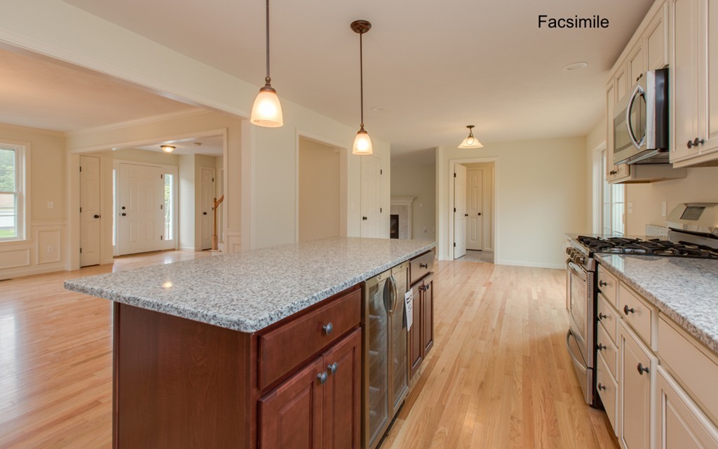 Lot 2-55-4 Old County Road Pelham, NH 03076 - Photo 4 of 16 a kitchen with a counter top space a sink appliances and cabinets