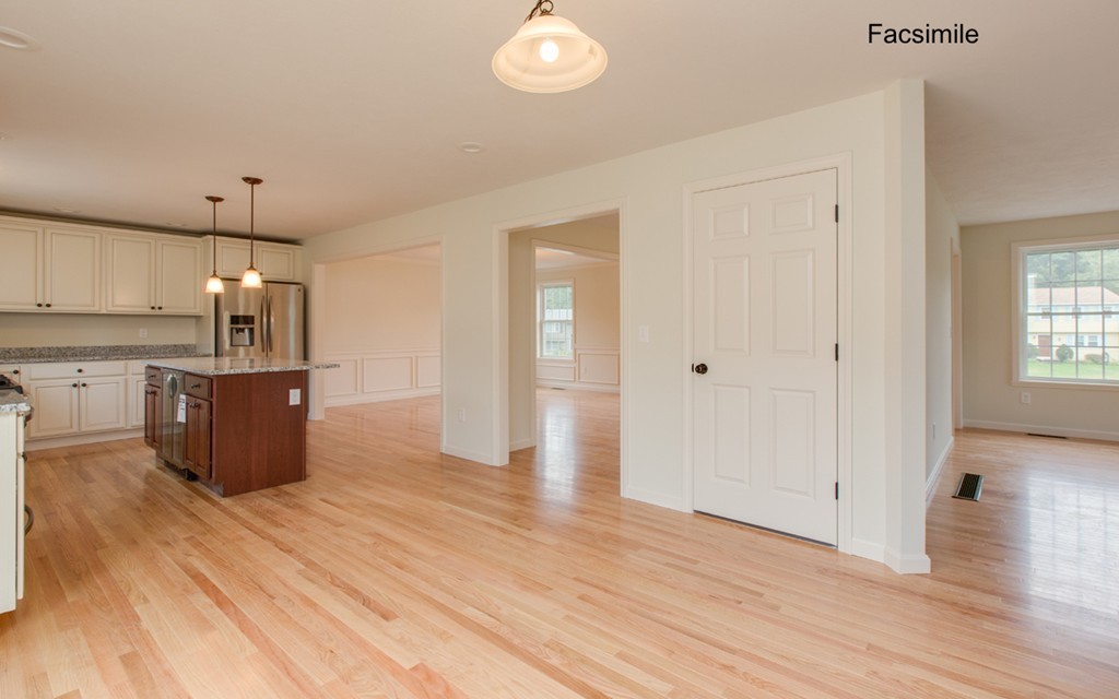Lot 2-55-4 Old County Road Pelham, NH 03076 - Photo 5 of 16 a large room with chandelier fan and windows