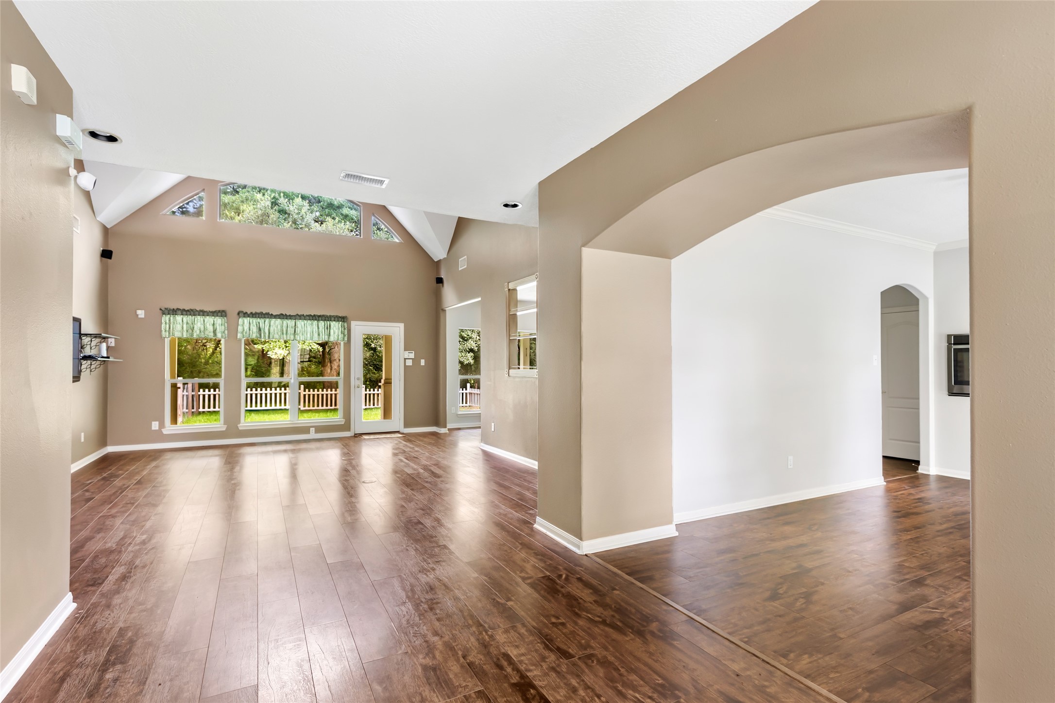123 Burwell Road Highlands, TX 77562 - Photo 5 of 25 Walk into the main living area with high ceilings and plenty of natural light
