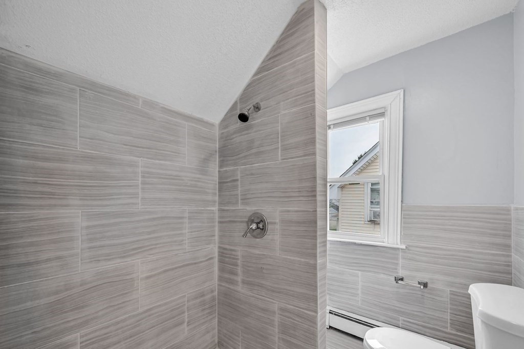54 Littleton Street Springfield, MA 01104 - Photo 23 of 30 a bathroom with a shower