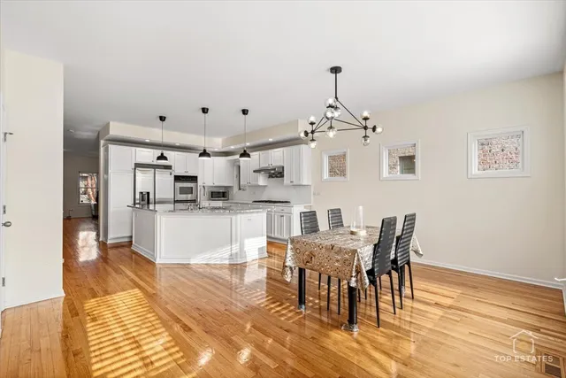 a view of a dining room with furniture
