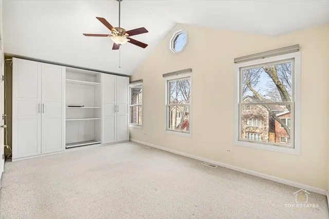 a view of a bathroom with a shower and a glass door