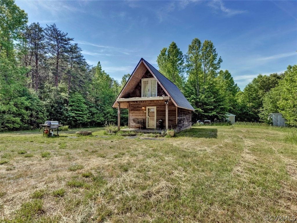 357 Belle Road Dillwyn, VA 23936 - Photo 2 of 29 a house with trees in the background
