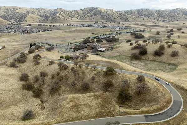 a view of ocean and mountain