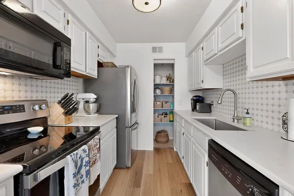 $229,000 | 330 West Harwood Road, Unit D, Hurst, TX 76054