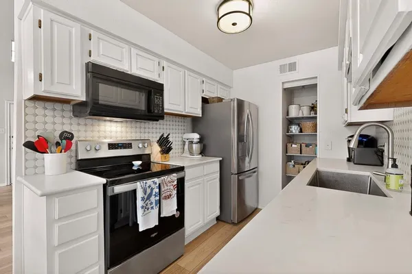 $229,000 | 330 West Harwood Road, Unit D, Hurst, TX 76054