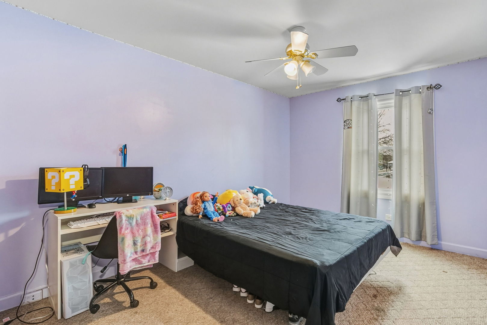 3668 Grandview Avenue Gurnee, IL 60031 - Photo 13 of 25 a bedroom with a bed and a chandelier