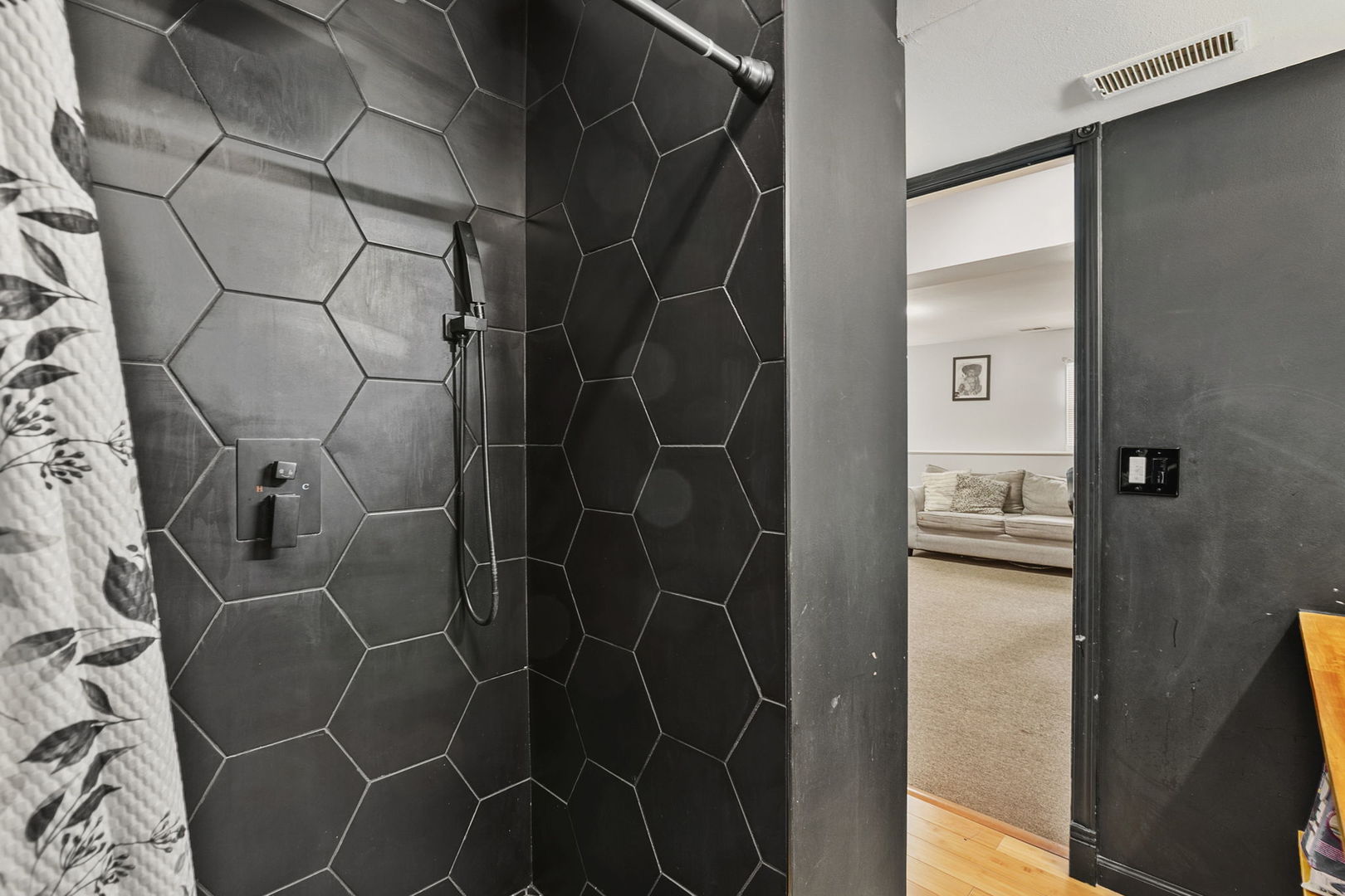 3668 Grandview Avenue Gurnee, IL 60031 - Photo 19 of 25 a bathroom with a shower and a glass door