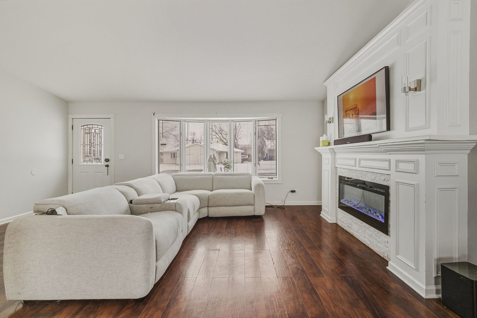 3668 Grandview Avenue Gurnee, IL 60031 - Photo 2 of 25 a living room with furniture and a fireplace