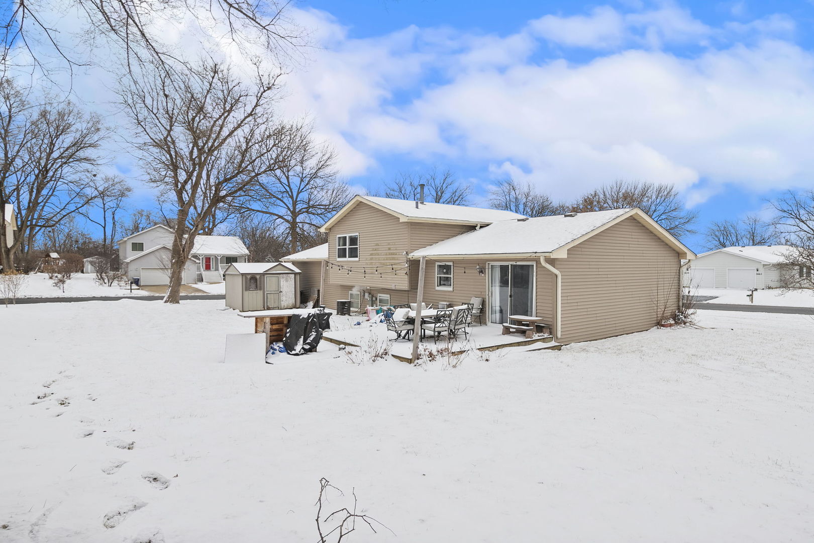 3668 Grandview Avenue Gurnee, IL 60031 - Photo 23 of 25 a view of a house with snow on the road