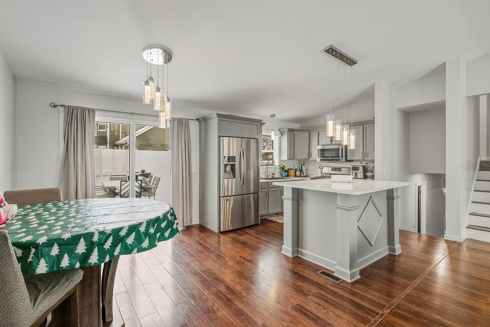3668 Grandview Avenue Gurnee, IL 60031 - Photo 8 of 25 a kitchen with a sink refrigerator and microwave
