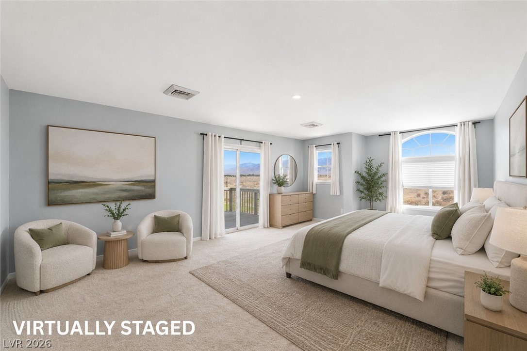 2570 East Kellogg Road Pahrump, NV 89048 - Photo 25 of 60 Virtually Staged oversized primary bedroom with sitting area and private balcony