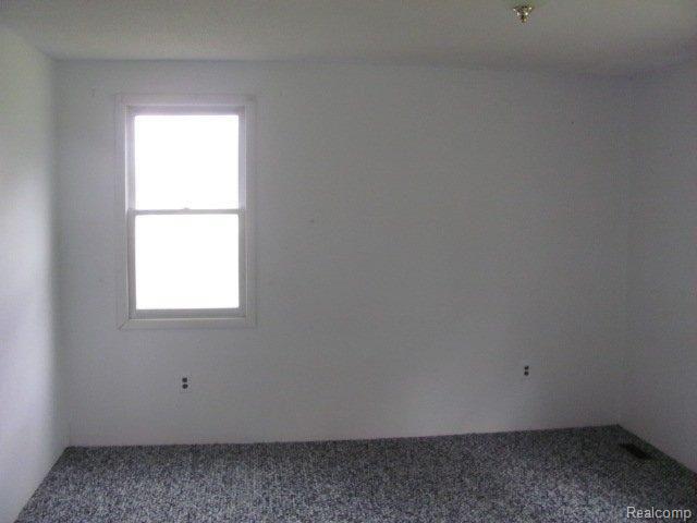 5464 Sutton Road Dryden, MI 48428 - Photo 5 of 11 262-159494 - Bedroom 1.jpg