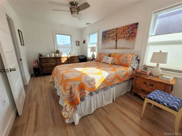 a bed room with a bed and a window