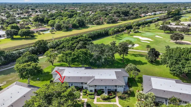 a view of a golf course with a garden