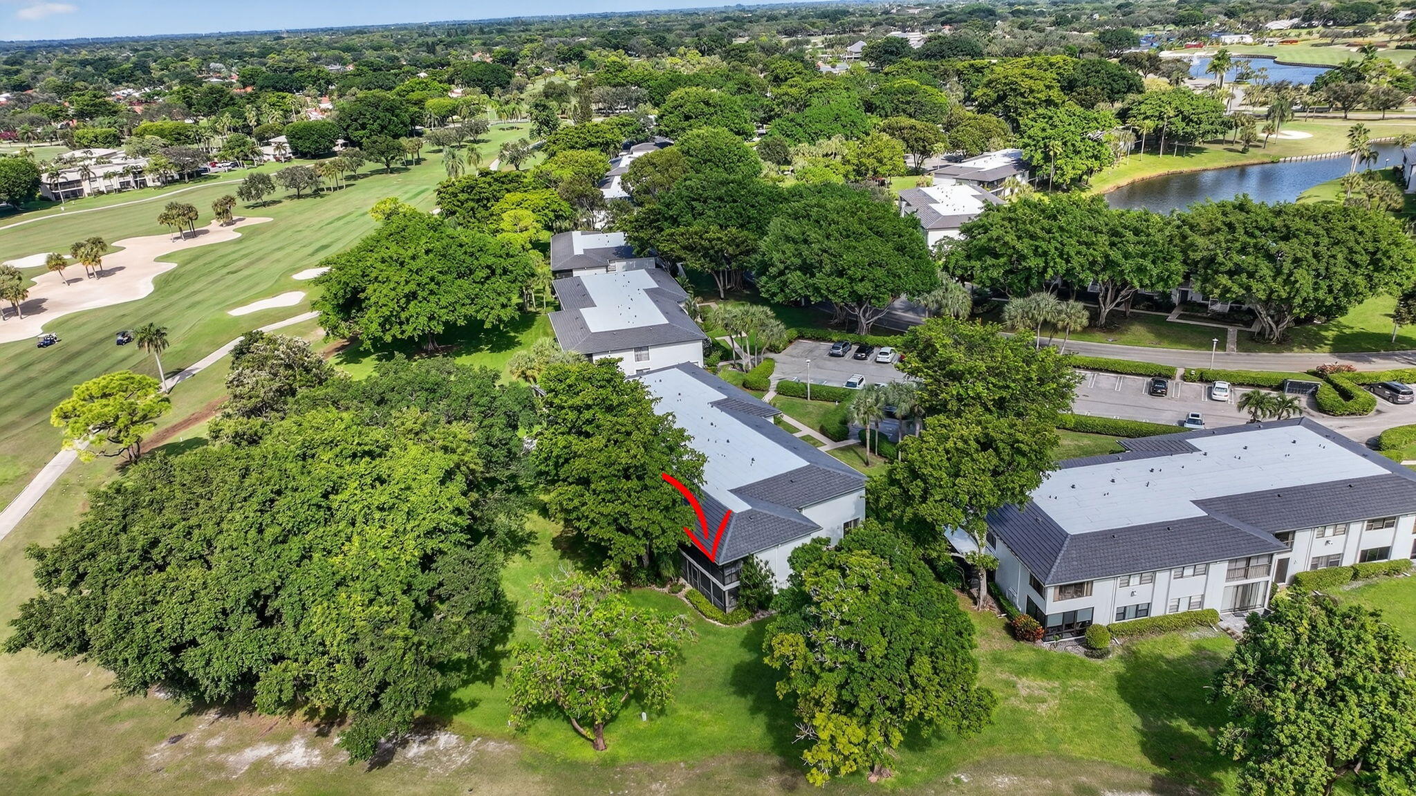 10 Southport Lane, Unit B Boynton Beach, FL 33436 - Photo 44 of 80 an aerial view of residential house with outdoor space and trees all around