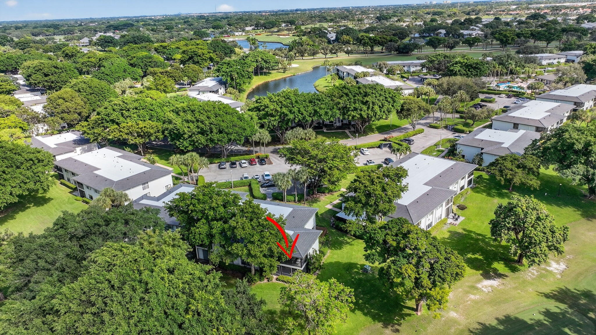 10 Southport Lane, Unit B Boynton Beach, FL 33436 - Photo 45 of 80 an aerial view of residential house with outdoor space and trees all around