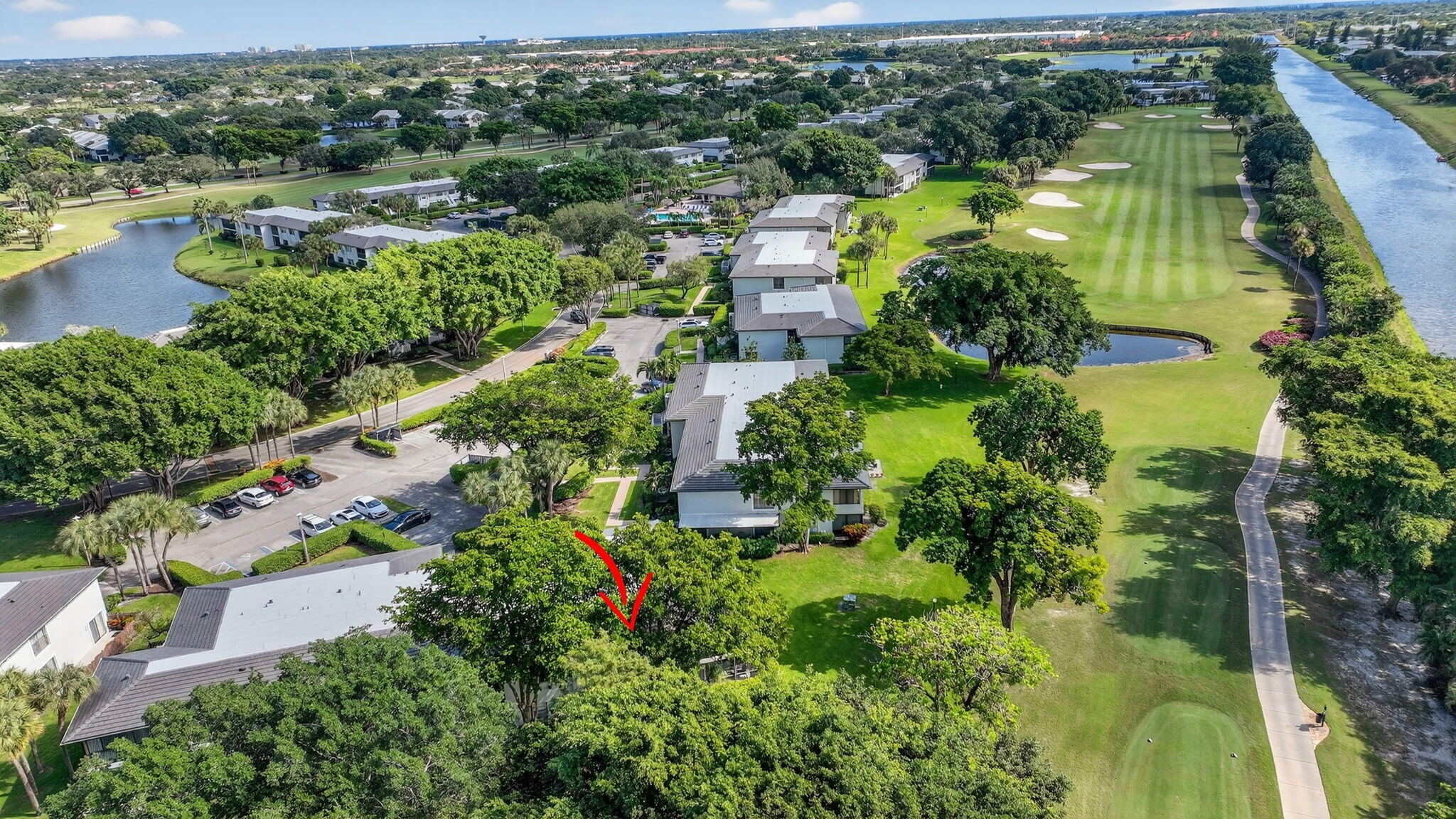 10 Southport Lane, Unit B Boynton Beach, FL 33436 - Photo 46 of 80 an aerial view of residential houses with outdoor space and lake view