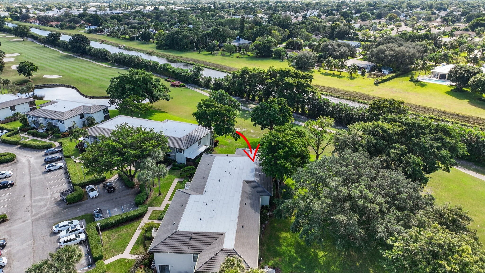10 Southport Lane, Unit B Boynton Beach, FL 33436 - Photo 48 of 80 an aerial view of residential houses with outdoor space and swimming pool