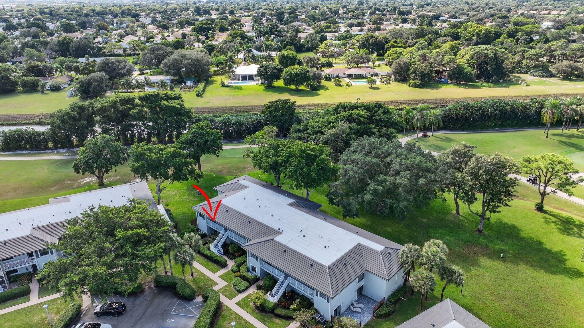 10 Southport Lane, Unit B Boynton Beach, FL 33436 - Photo 49 of 80 an aerial view of residential house with outdoor space and lake view