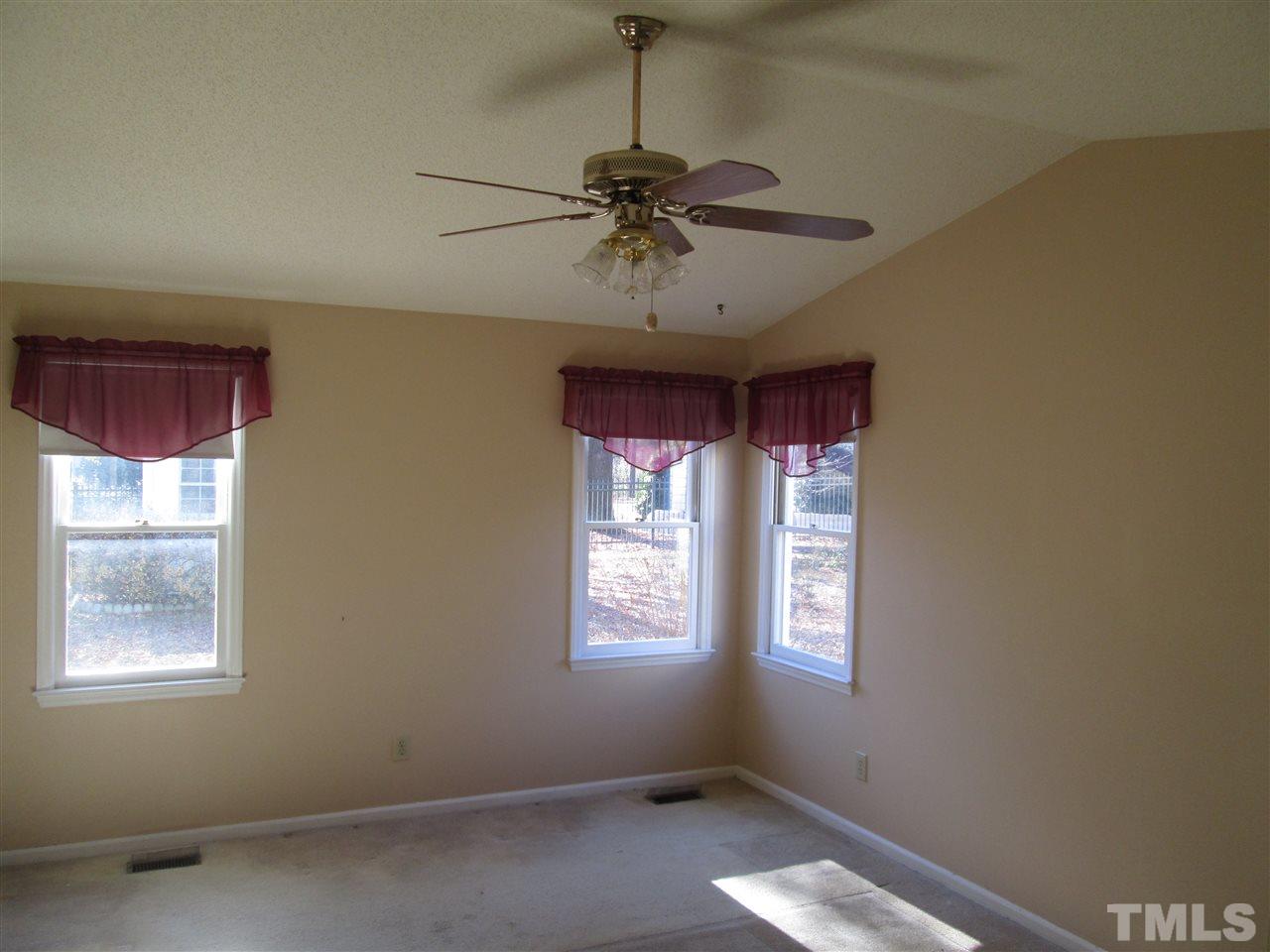 2600 Denbigh Court Raleigh, NC 27604 - Photo 12 of 13 a view of a windows and chandelier in a room